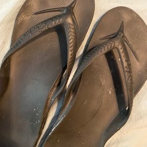 Archie’s flip flops. Size 8